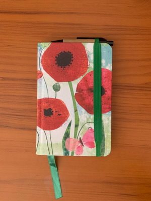Floral notebook like new with pen, elastic band and bookmark