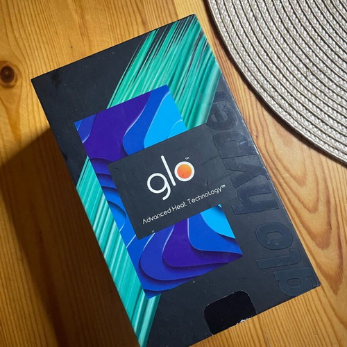 Glo Hyper Starter Kit used with cleaning brush and USB-C cable