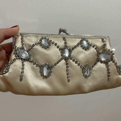 Clutch golden like new with long straps