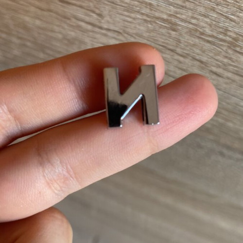 Decorative bead shaped like letter N silver, like new