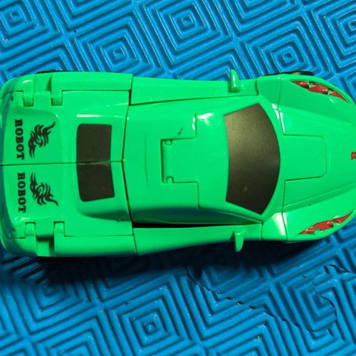 Robot Cars set of 2 like new, blue and green toy cars