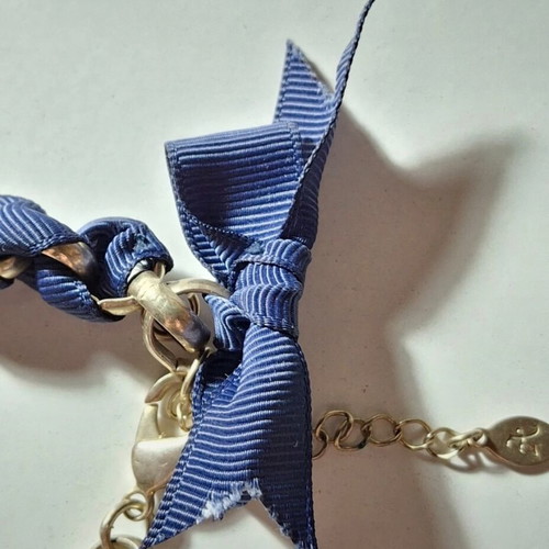 Coquette bracelet like new, blue and gold