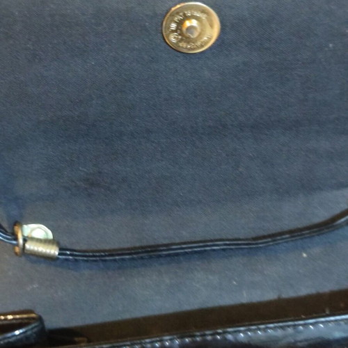 Shoulder bag used black patent leather with purple detail