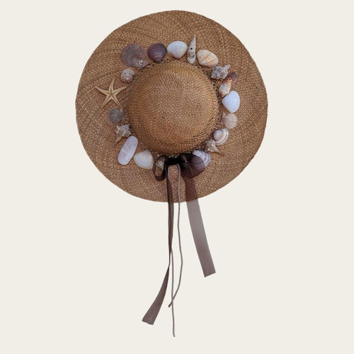 Handmade straw hat with seashells