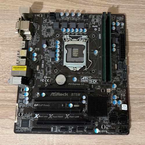 ASRock B75M motherboard with 4GB DDR3 RAM used, untested