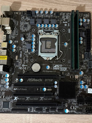 ASRock B75M motherboard with 4GB DDR3 RAM used, untested