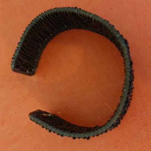 Black bracelet used, adjustable size