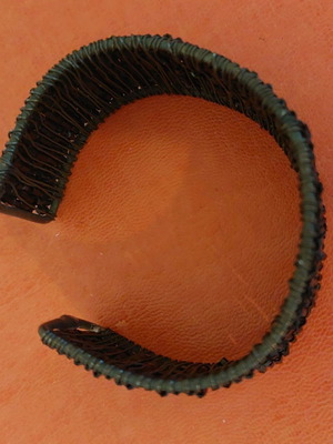 Black bracelet used, adjustable size