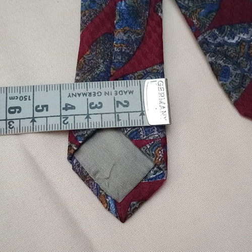 Silk tie 10cm like new, red with multicolor pattern