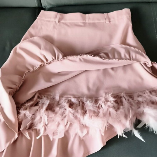 Upcycled asymmetric skirt with ruffles and pink feathers, SBETRO