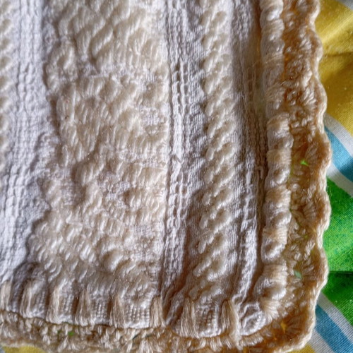 Woven throw used, practical for anywhere