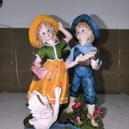 Decorative figurine with children like new