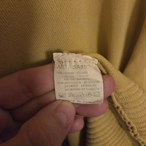 Yellow spring blouse used, size small with buttons on back