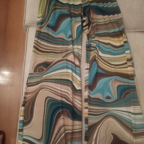 One-piece colorful sleeveless jumpsuit with wrap design, like new