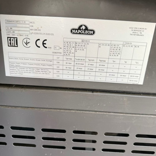 Napoleon Prestige Pro 665 gas grill used with hood and rotisserie