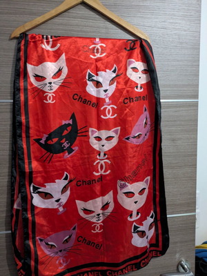 Red satin scarf with cat pattern used