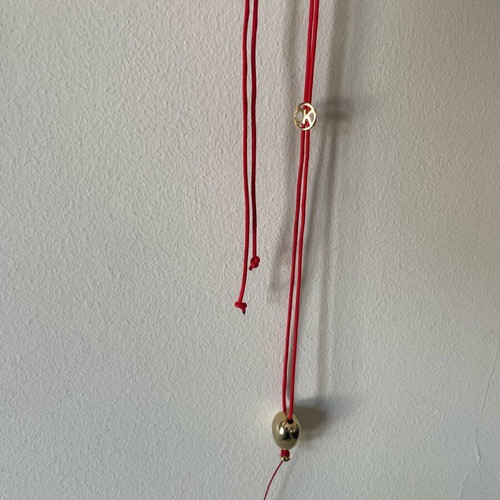 Kessaris necklace used with gold-plated balloon-shaped pendant