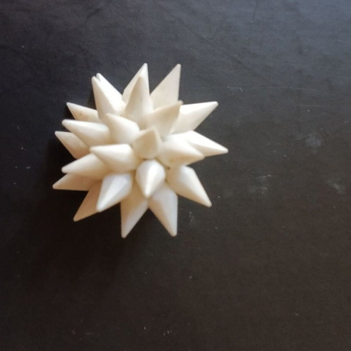 Vintage white clip-on earrings used from the 1960s