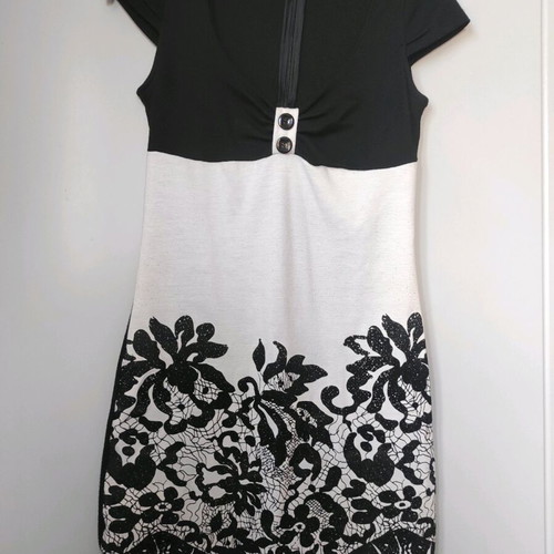 Mini dress like new, black and white with decorative buttons