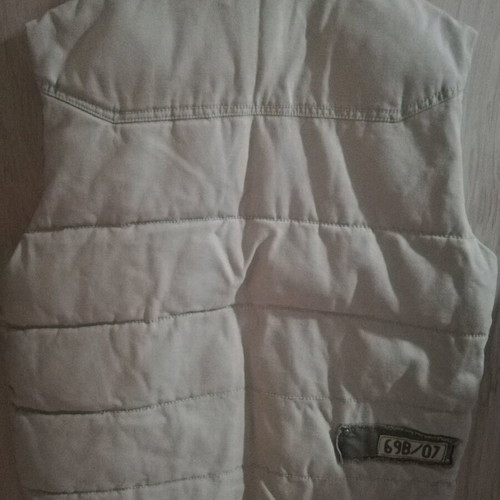 Children's sleeveless beige jacket like new for ages 10-12