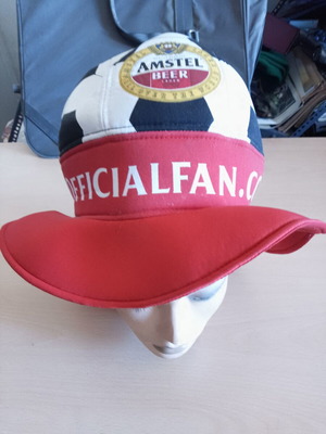 Amstel promotional collectible hat shaped like a football