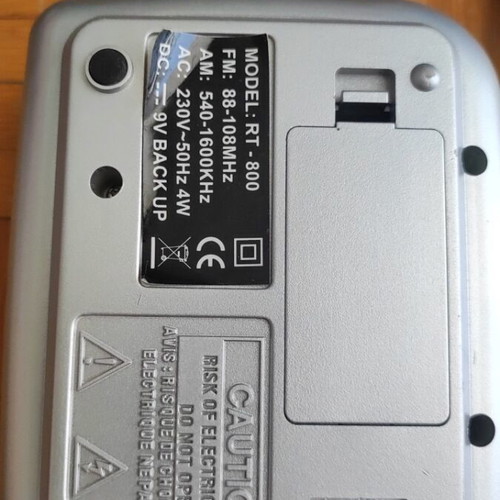 Digital alarm clock used with radio and minor display lines
