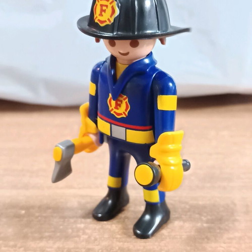 Playmobil Firefighter with Axe and Flashlight like new