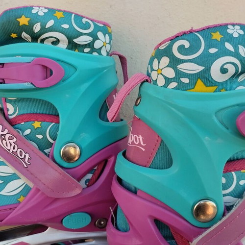 Xspot adjustable rollers size 35/37 used, turquoise pink with flowers