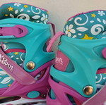 Xspot adjustable rollers size 35/37 used, turquoise pink with flowers