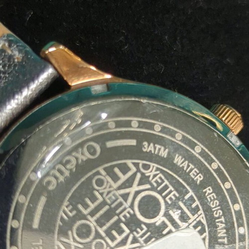 Oxette wristwatch women's new with silver strap and rose gold case