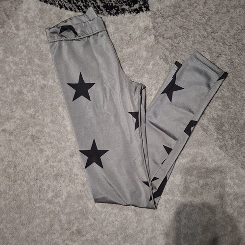 Hyper women's silver leggings with black stars, one size