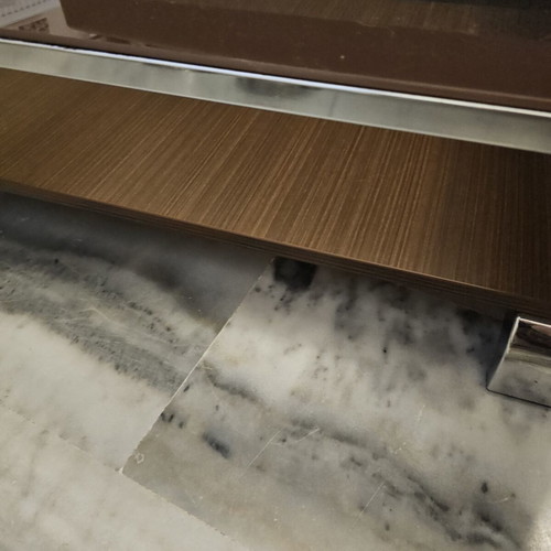 Coffee table used with glass top and storage space, brown and beige