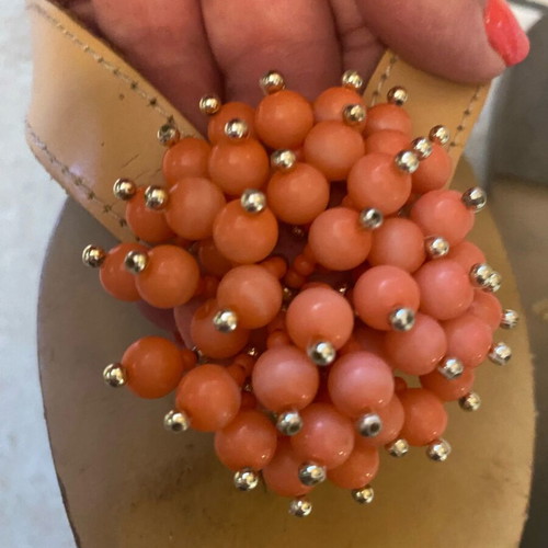 Leather sandals used with orange glass bead flower