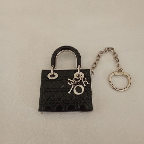 Christian Dior keychain with lipstick, like new, black and silver