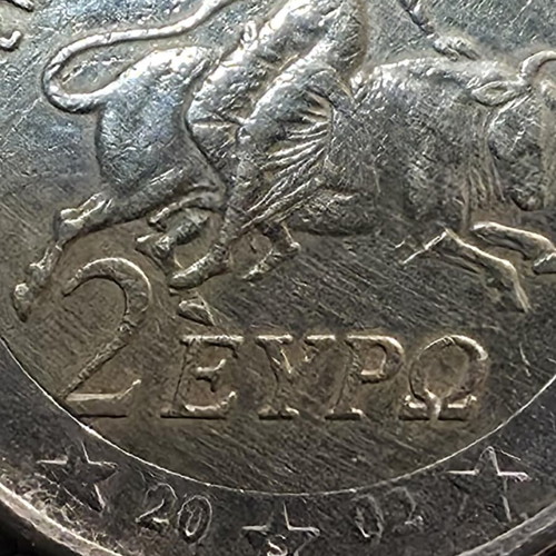 2 Euro 2002 Greece coin with 4 minting errors