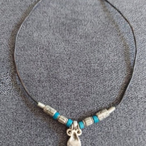 Vintage choker necklace with turquoise stones on leather band used