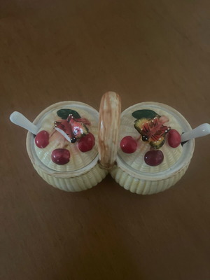Ceramic jam pots used with spoons and decorative butterfly