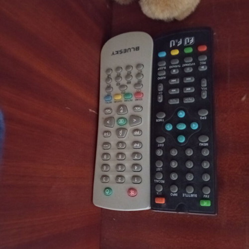 Blue Sky and Fandu TV remote controls like new, set of two