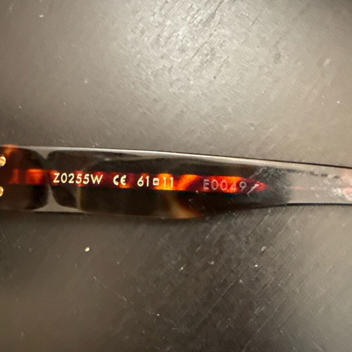 Louis Vuitton sunglasses used with case and small bag brown