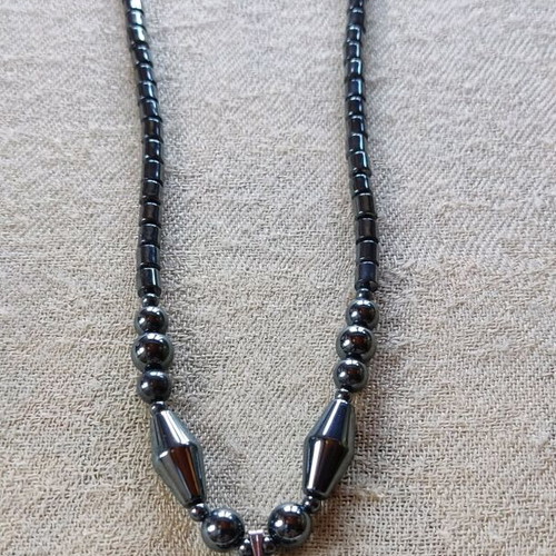Hematite necklace like new with dolphin pendant