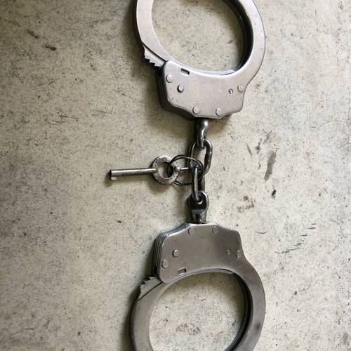 Old gendarmerie handcuffs used with original key