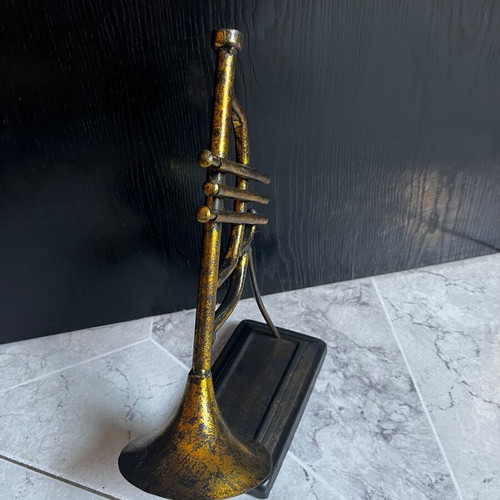 Vintage brass decorative musical instrument with black base, 30 cm