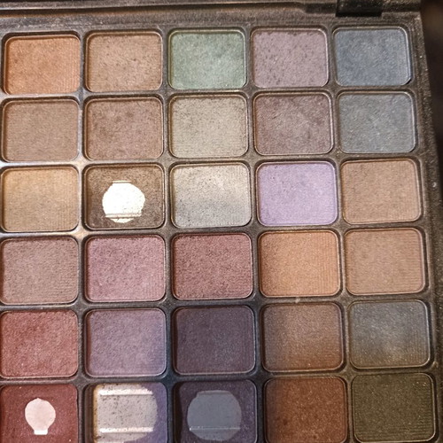 Eyeshadow palettes used, 2 pieces, one large and one small