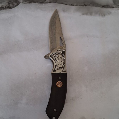 Folding knife from Damascus steel new