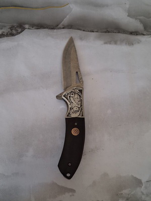 Folding knife from Damascus steel new