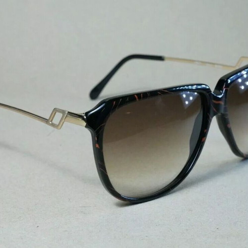 Italian Luxottica 8589 sunglasses used, black and brown