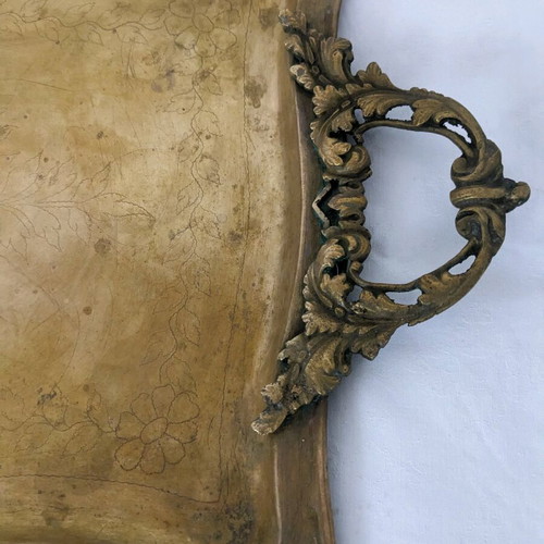 Vintage brass serving tray used with carved handles