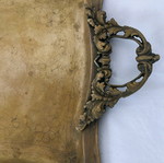 Vintage brass serving tray used with carved handles