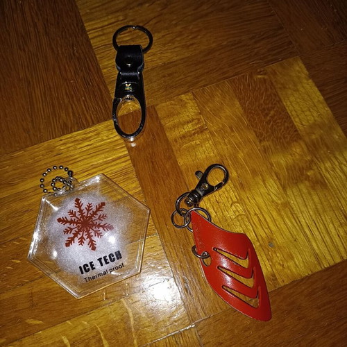 Peugeot, shark fin and snowflake keychains like new