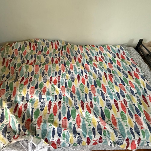 Bed sheet with colorful fish pattern